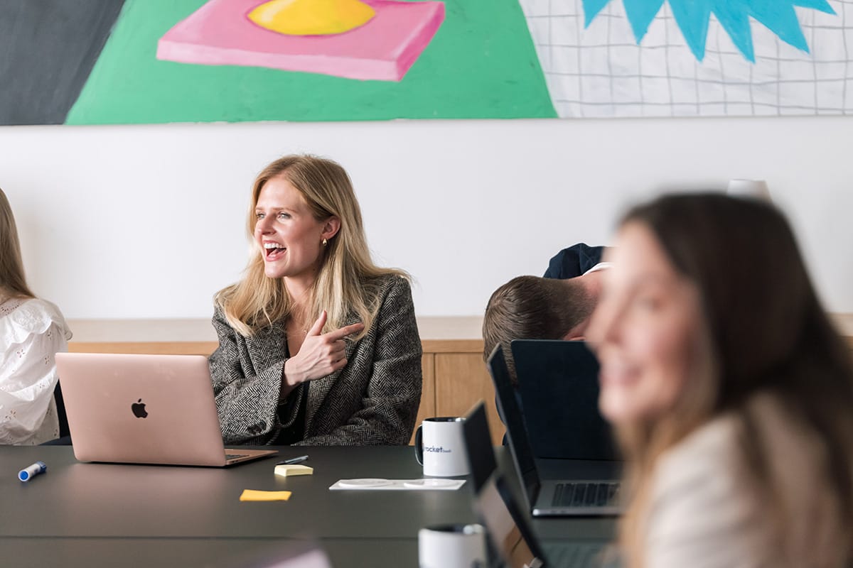 Account director Jess - sharing business wisdom nuggets in a meeting